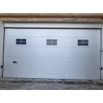 Insulated overhead sectional garage door
